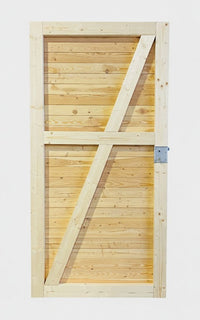 Rückansicht einer massiven Holztür für das Gartenhaus KLARE LINIE, mit diagonaler Verstrebung